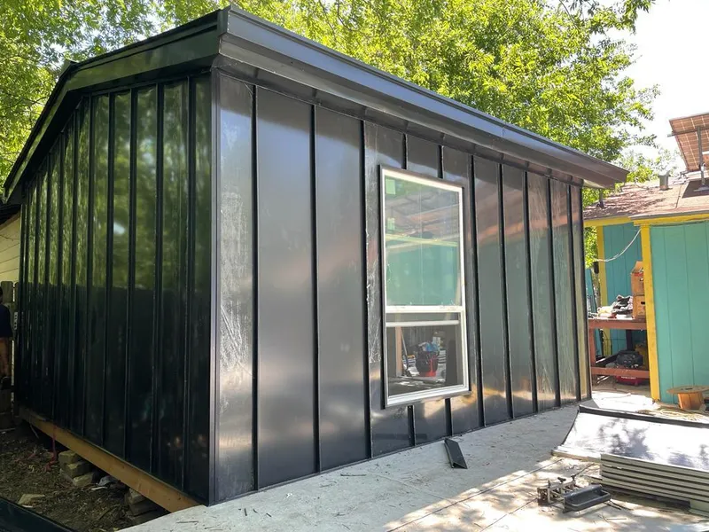 Black standing seam metal wall panels for Metal Roof Installation in Fulton