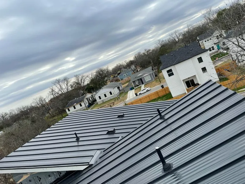 Standing seam metal roof panels with vents for Skylight Repair in Fulton
